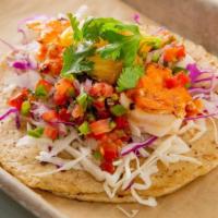 Grilled Shrimp Taco · Gluten-free. Grilled shrimp marinated in coconut milk, cabbage, pico de gallo, grilled pinea...