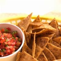 Chips With Salsa (Pico De Gallo) · Vegan, gluten-free. Organic corn tortilla chips seasoned with original spice mix, tomato, on...
