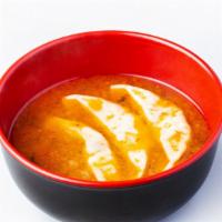 Vegetable Dumpling Soup · Organic miso, vegetable broth, vegetable dumpling, and organic sesame oil.