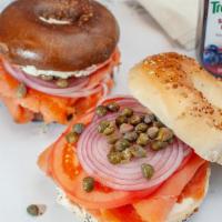 9) The Nova Scotia · Sliced Lox, Cream Cheese , Red Onions, Tomato and Capers