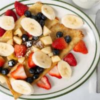 Fruit Crepes · Three delicious crepes filled with choice of strawberry, banana, apple cinnamon and blueberr...