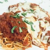 Chicken Parmigiana · With spaghetti.