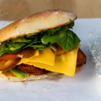Crispy Chicken Cutlet With American Cheese Sandwich · Ripe avocado, hot cherry peppers, tomato, leafy lettuce, and honey Dijon mustard.