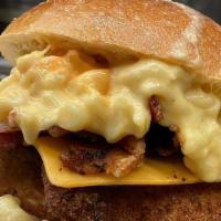 Mac N' Chicken · Crispy Chicken Cutlet topped with Melted Cheddar, Cheddar Mac and Cheese, Crispy Bacon, and ...