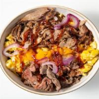 Short Rib Scrambowl · Scrambled eggs with tater tots, braised short rib, caramelized onions, cheddar cheese and ho...