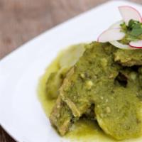 Bistec En Salsa Verde · Steak and green tomatillo sauce with potatoes.served with rice and beans and 3 fresh homemad...