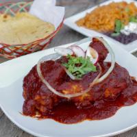 Mole · Homemade Mexican mole sauce with chicken. Served with a side rice and beans and 3 fresh home...