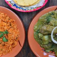 Costillas En Salsa Verde Con Papas · Pork ribs in green sauce with Mexican parsley. Served with a side rice and beans and 3 fresh...