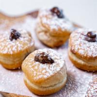 Nutella Mini Donuts · (4count) Oven baked dough filled with creamy nutella.