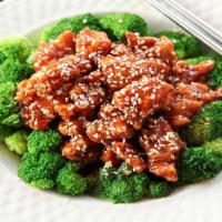 Sesame Chicken Platter · Spicy, White meat. Served with egg roll and roast pork fried rice