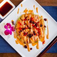 Sushi Pizza · Pancake with slices of fish, guacamole, and spicy sauce. Your selection of fish, tuna, or sa...