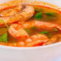 Tom Yum Goong Soup · Shrimp with Thai famous hot and sour lemongrass soup. Spicy.