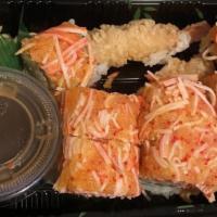 Angry Dragon Roll · Shrimp tempura and avocado topped with crunch spicy snow crab, special sauce, and eel sauce.