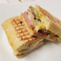 Cuban Sandwich · Cuban Style Pressed Sandwich with Virginia Style Ham, Thin Sliced House Roasted Pork, Melted...