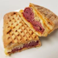 Classic Panini Pressed Reuben Sandwich · Classic Reuben with Corned Beef, Sauerkraut, Melted Swiss Cheese and a Creamy Russian Dressi...