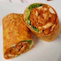 Spicy Buffalo Style Chicken Wrap · Spicy Buffalo Crispy Chicken Wrap with Lettuce, Tomato and a Creamy Blue Cheese Spread