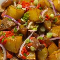 World Famous Warm Roasted Potato Salad (8Oz) · Roasted Potato Salad tossed with a Sweet Onion Vinaigrette, Red Onion, Scallion and Roasted ...