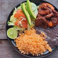 Camarones A La Diabla · Fried shrimp bathed in our homemade diabla sauce, served with Mexican rice, bay-leaf infused...