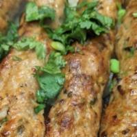 Lamb Kabab (4 Pieces) · Minced lamb kababs marinated with fresh spices, juicy and flavorful cooked in tandoor.