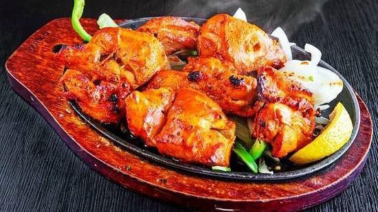 Chicken Tikka Boti · Tandoori style BBQ marinated in our in-house special spices spicy and flavorful.