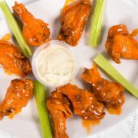 Buffalo Wings · Served with celery and blue cheese