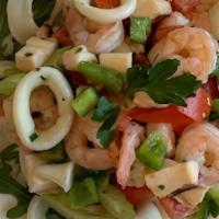 Seafood Salad (Small) · Shrimp, Calamari, Octopus, capers and Arugula with Olive Oil Lemon Dressing