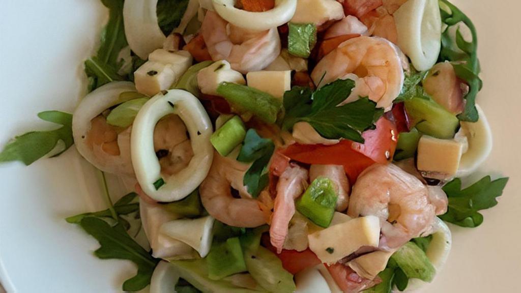 Seafood Salad (Small) · Shrimp, Calamari, Octopus, capers and Arugula with Olive Oil Lemon Dressing