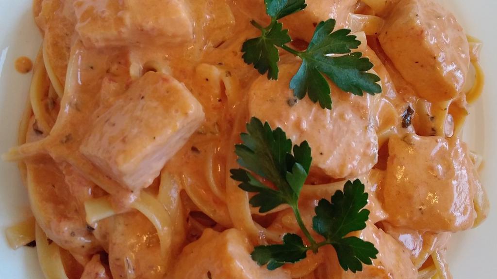 Pasta Al Salmone · Pasta with fresh salmon in our homemade vodka sauce.