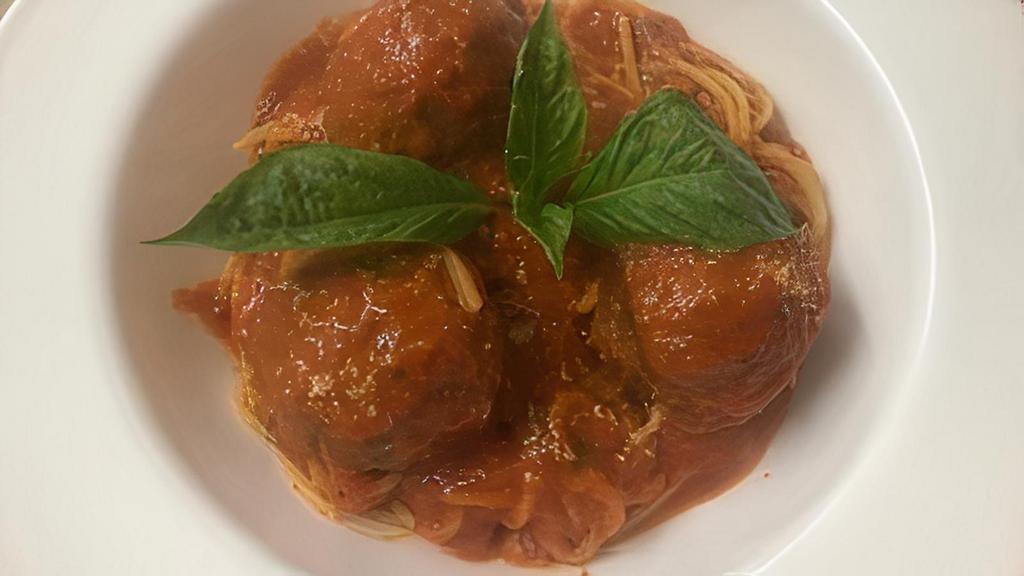 Spaghetti Con Polpette · Meatballs, tomato Sauce, Parmesan.
