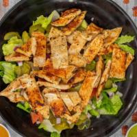 Grilled Chicken Breast Salad · Grilled seasoned chicken strips.