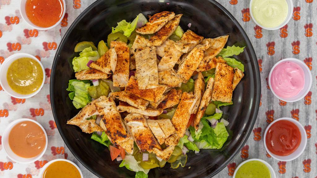 Grilled Chicken Breast Salad · Grilled seasoned chicken strips.