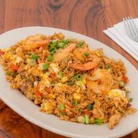 Chaufa Mixto · Fried rice with beef, chicken, shrimp, and egg.