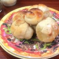 Garlic Knots (6) · Dough Knots Covered With Homemade Garlic Butter And Baked To Golden Crisp Served With A Side...