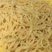 Spaghetti Carbonara · Spaghetti with a white cream sauce sautéed with prosciutto and onions.