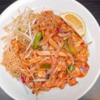 Pad Thai · Thai style pan fried rice noodle with bean sprout, egg, bean curd, onion, and peanut.