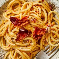 Spaghettoni Cacio E Pepe · with Pecorino Romano DOP, Black Pepper and Crusco Pepper