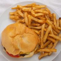 Cheeseburger Combo · Served with french fries and a can of soda. What comes on the burger is ketchup,mustard,mayo...