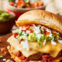 Mexican Burger · Chorizo, sautéed onions, jalapeño peppers, Pepper Jack cheese, lettuce, tomatoes and chipotl...