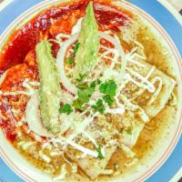 Enchiladas · Three corn tortillas rolled around with choice of meat. Topped with sour cream, cheese, lett...