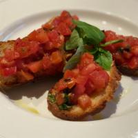 Bruschetta · Toasted bread with marinated fresh tomatoes, basil, extra virgin olive oil & a touch of garl...