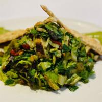 Serafina Chicken Salad · Free range chicken breast, romaine, mesclun, sun dried tomatoes, raisins, pine nuts, & pesto...