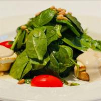 Goat Cheese & Spinach Salad · Honey, roasted pine nuts, & balsamic vinaigrette.