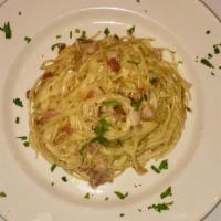 Spaghetti Carbonara · Bacon, Parmigiano Reggiano, Pecorino, eggs & black pepper.