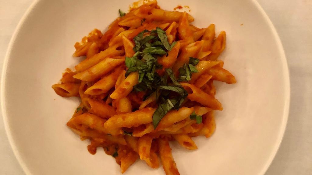 Penne Pomodoro & Basilico · Homemade tomato sauce, Parmigiano Reggiano & fresh basil.