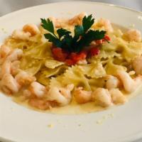 Farfalle Al Limoncello · Bow tie pasta, baby shrimp, cream & lemon zest.