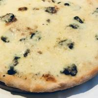Tartufo Nero Pizza · Our secret recipe, a bouquet of Italian cheeses & black truffle.