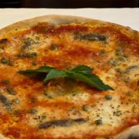 Napoletana · Tomato, mozzarella, anchovies, capers & basil.