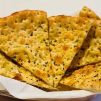 Cestino · Focaccia baked with herbs.