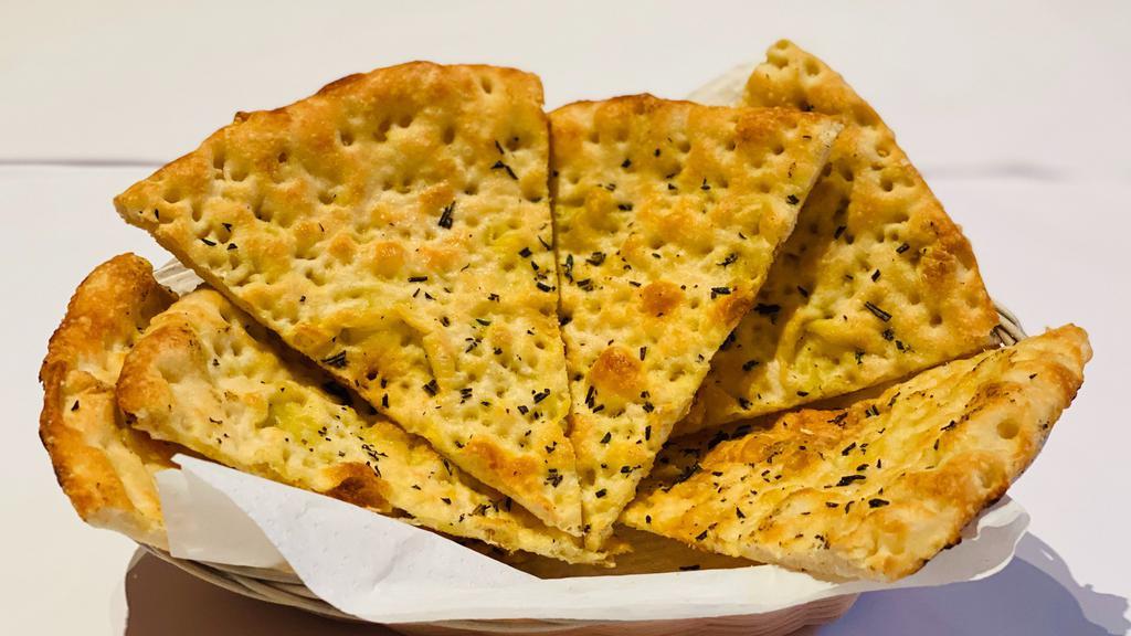 Cestino · Focaccia baked with herbs.