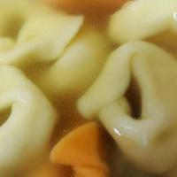 Cheese Tortellini In Brodo · Soup with ring shaped stuffed pasta.